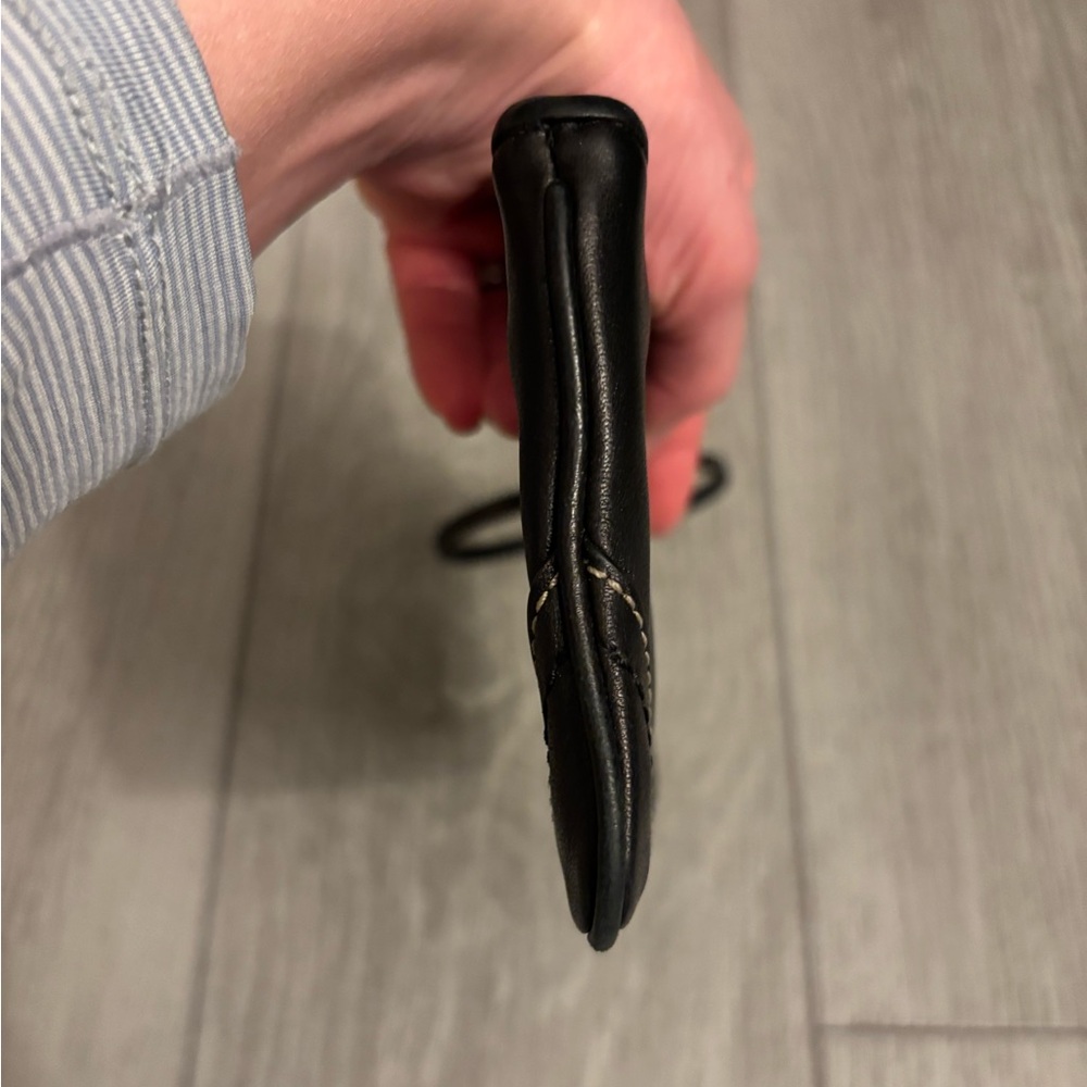 Coach wristlet in black leather. Hangtag present. EUC. - Picture 7 of 11